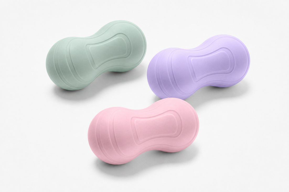 Neck support ball in sage green, blush pink, and lavender purple
