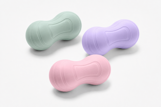 Neck support ball in sage green, blush pink, and lavender purple